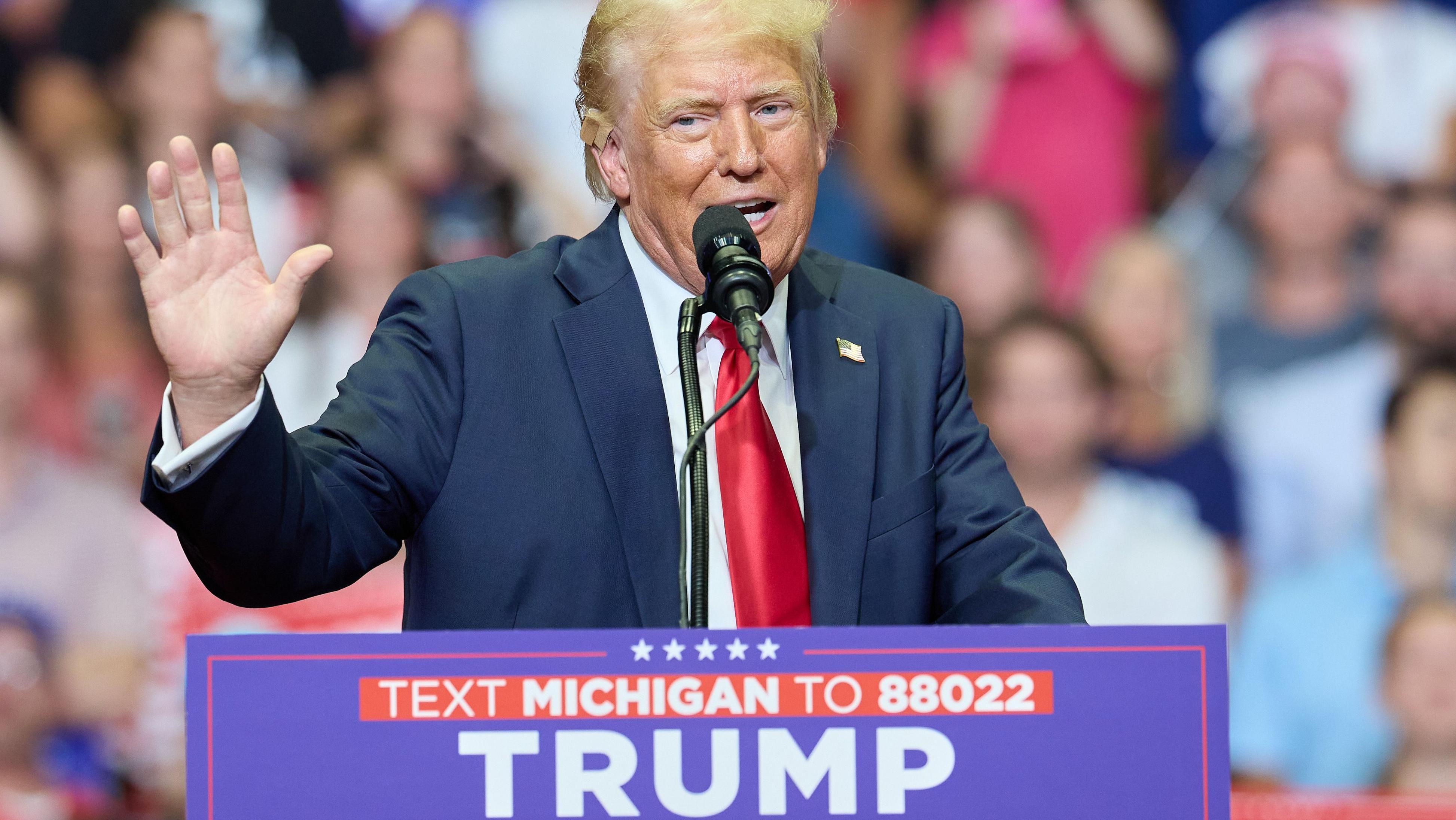 Trump tells thousands at Michigan rally he 'took a bullet for democracy'