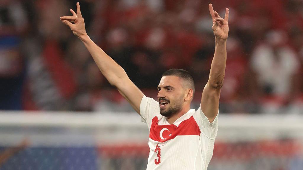 Turkish player Merih Demiral makes the wolf salute in a match against Austria at Euro 2024