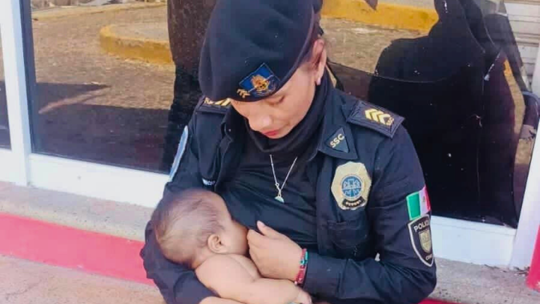 Arisbeth Dionisio con un bebé en Acapulco