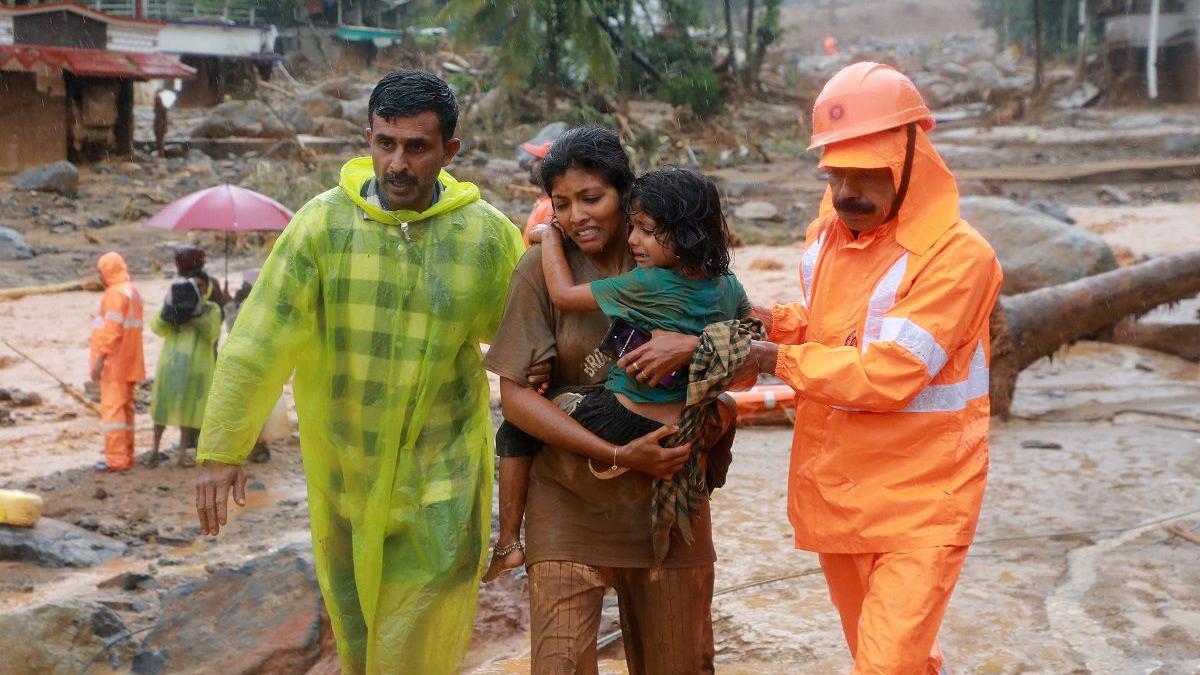 Twenty-four dead, dozens trapped in India landslides