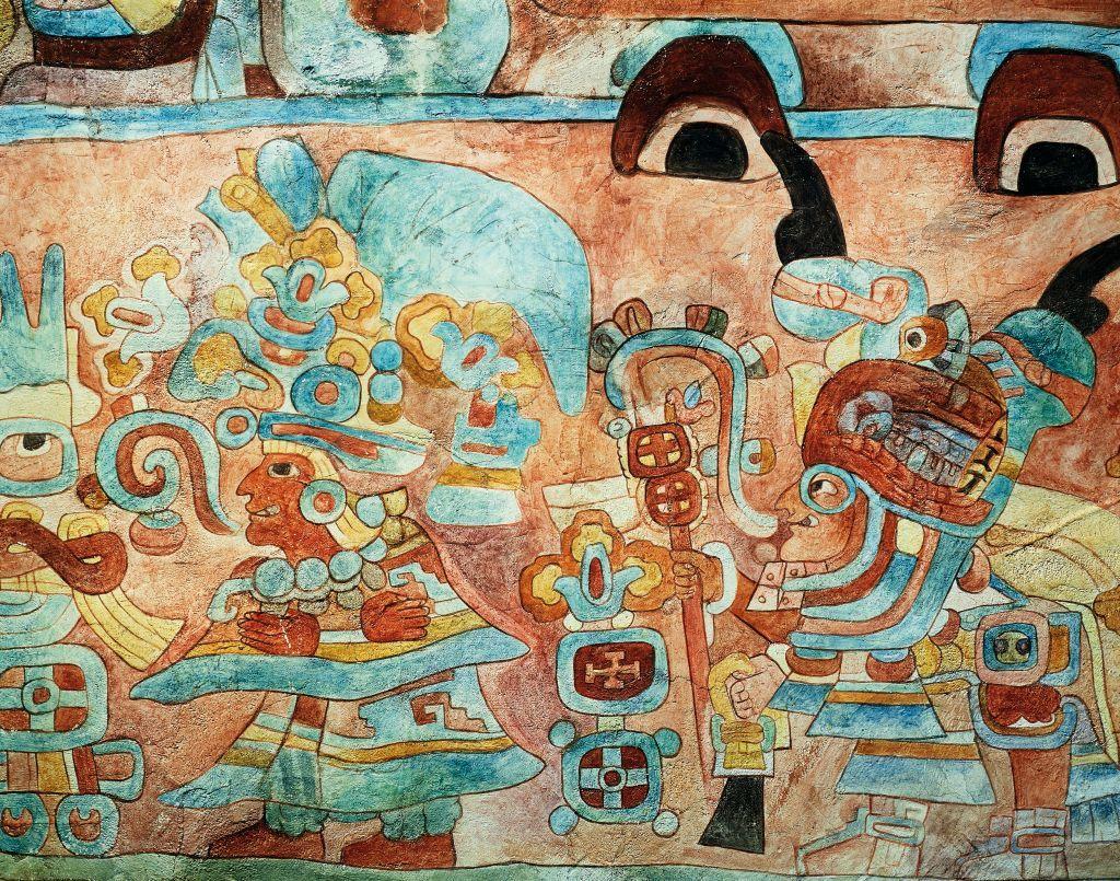 Mural con colores terracota, amarillo y azul