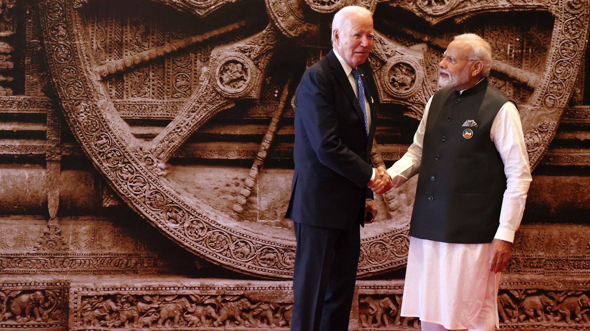 رئيس الوزراء الهندي ناريندرا مودي والرئيس الأمريكي جو بايدن.