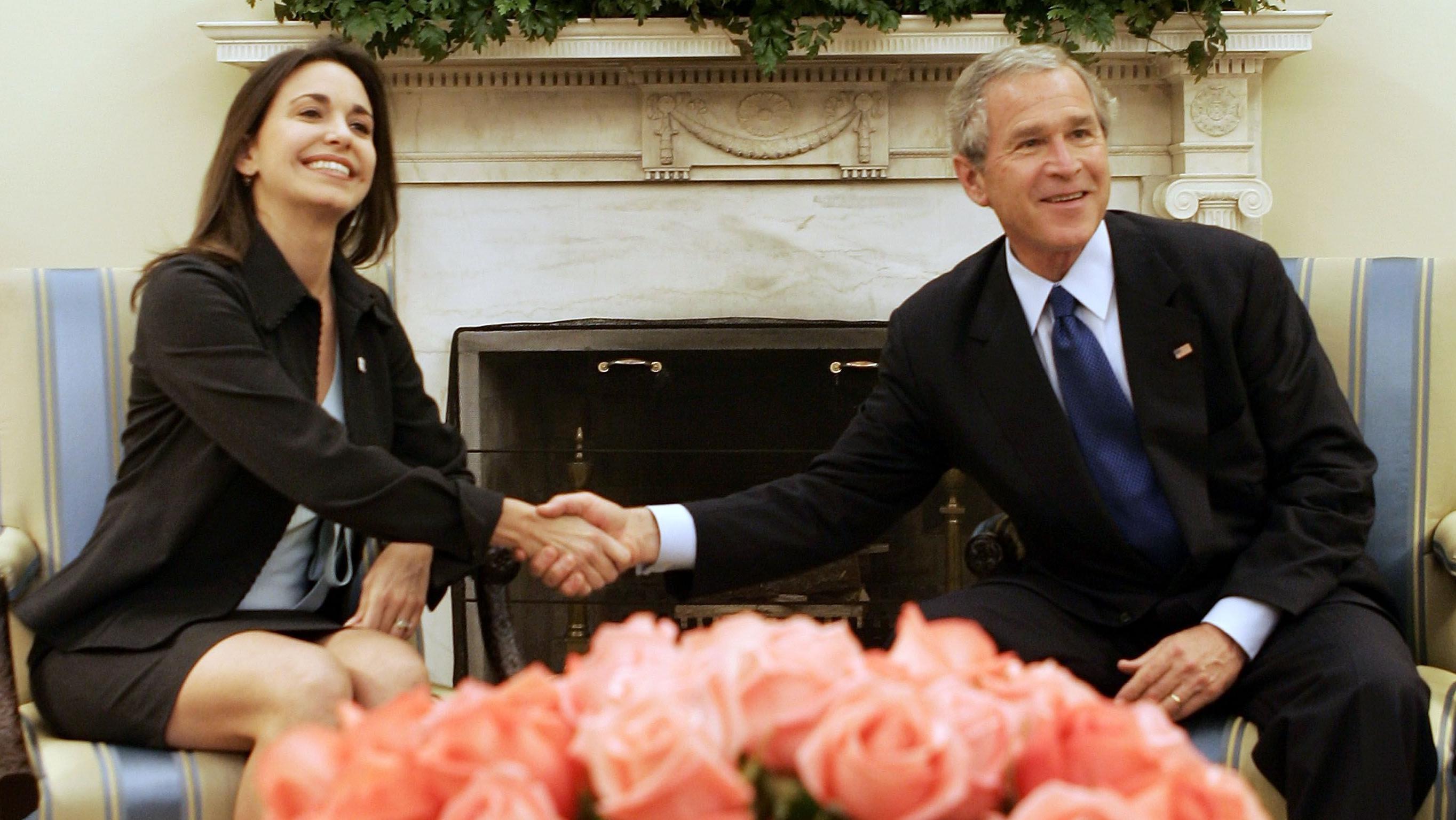María Corina Machado y George W. Bush.