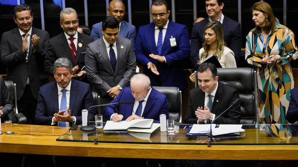 Lula, Lira e Pacheco durante a posse do presidente no Congresso em 1° de janeiro