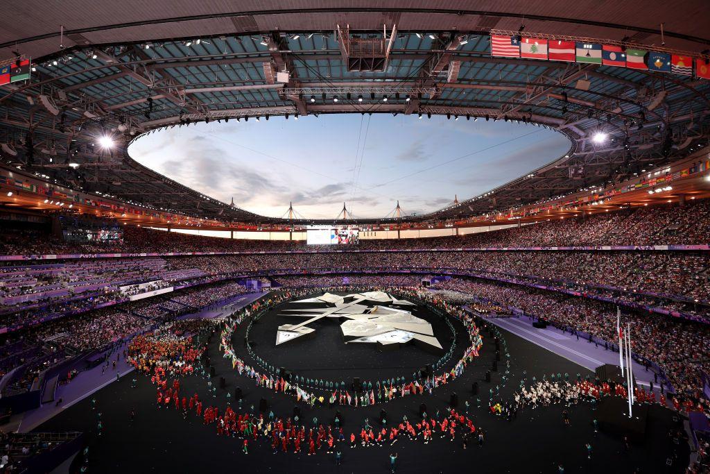 The flag parade at the closing ceremony of Paris 2024