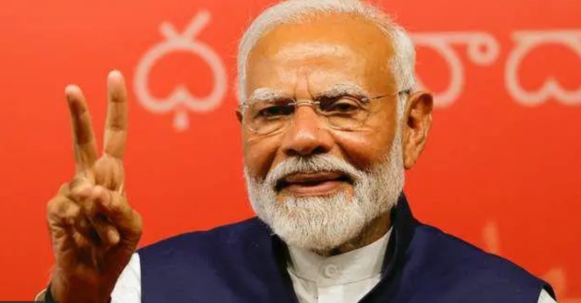 Narendra Modi fazendo sinal de 