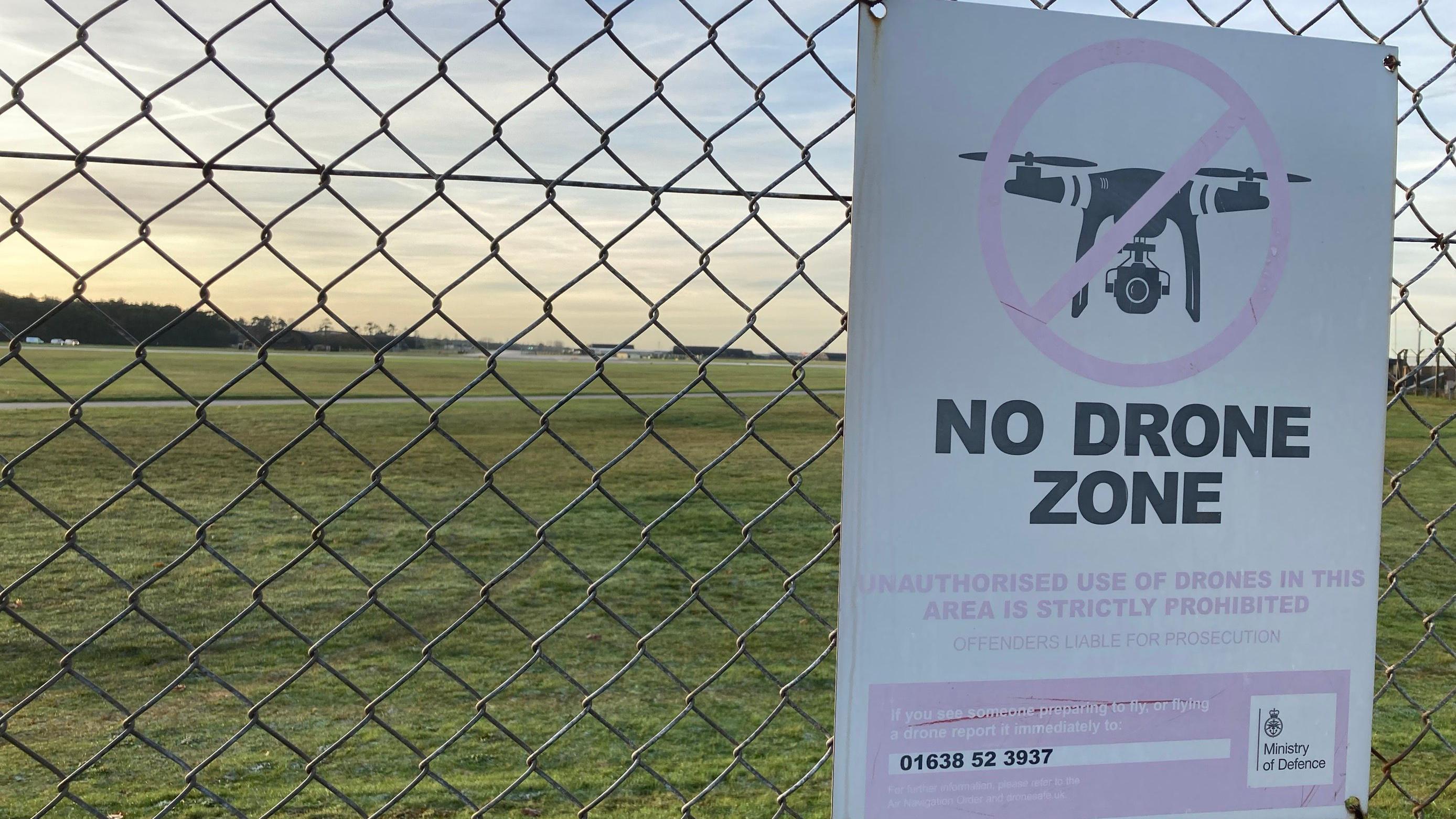 Why are drones flying near US airbases in England?