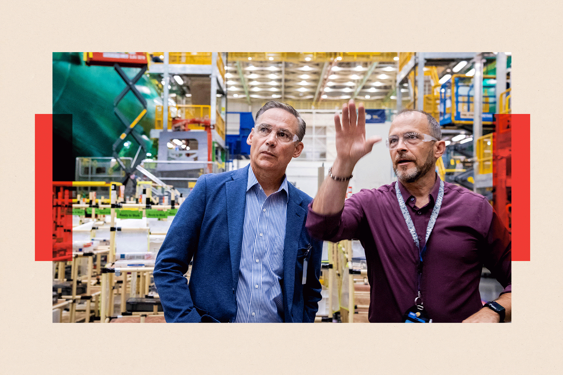 Boeing's new CEO Kelly Ortberg being shown around the plant, wearing safety glasses