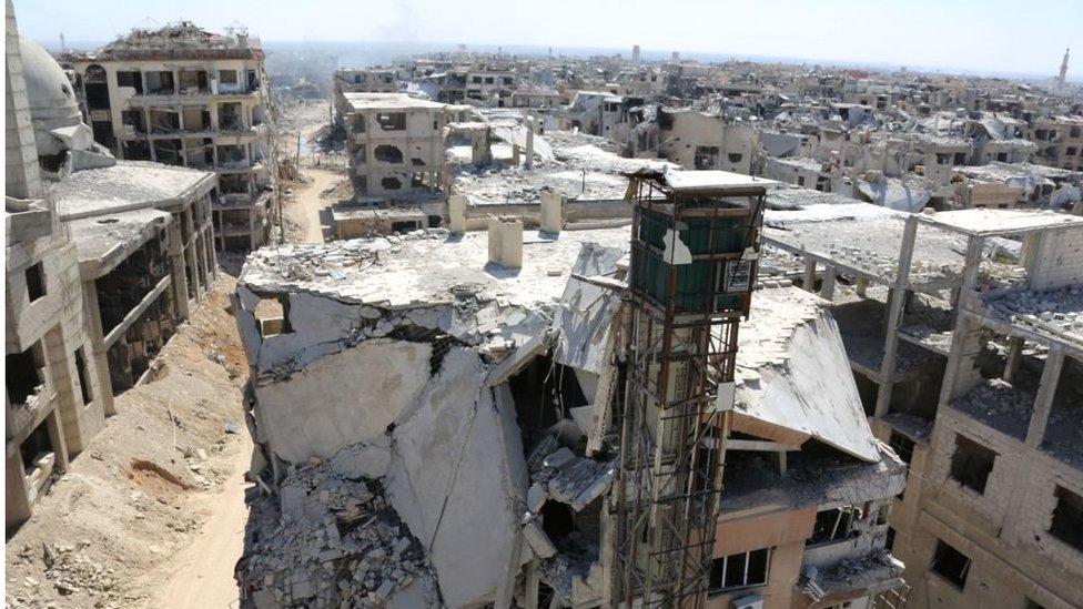 صورة تظهر الدمار في بلدة حرستا في الغوطة الشرقية، على مشارف دمشق ، في 26 مارس/آذار2018 