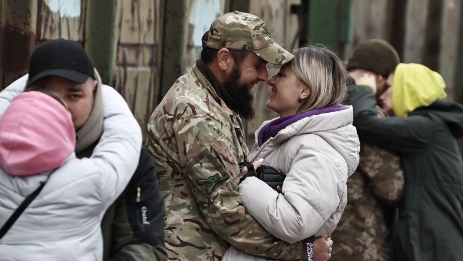 Ukrainian military personnel with their wives at the Kramatorsk train station, November 3, 2024