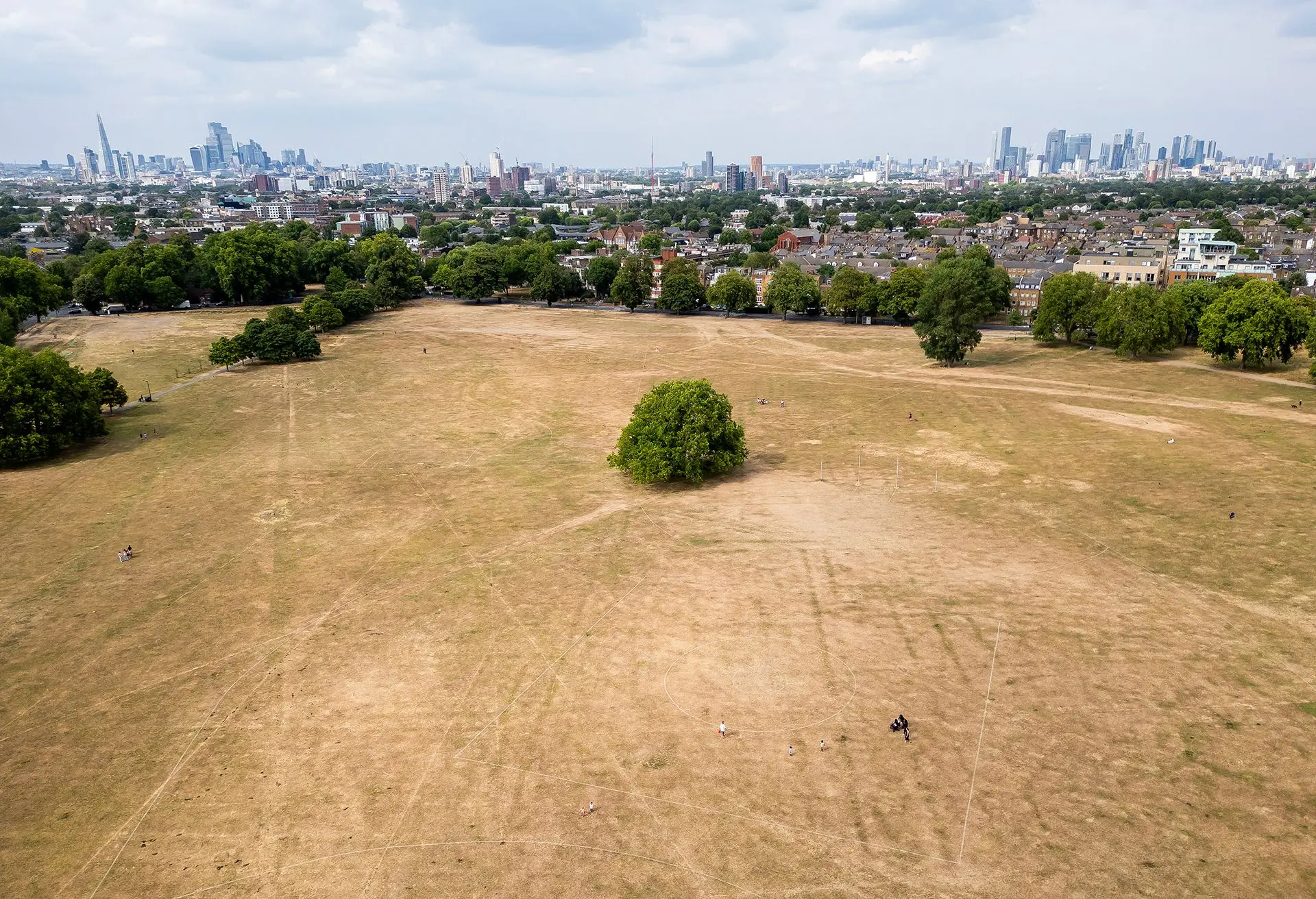 In this aerial view, dried grass is seen on Peckham Common on July 23, 2026 in London, United Kingdom.