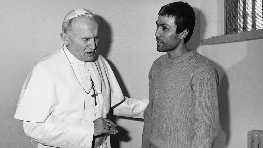 Pope John Paul II speaks with Mehmet Ali Agca