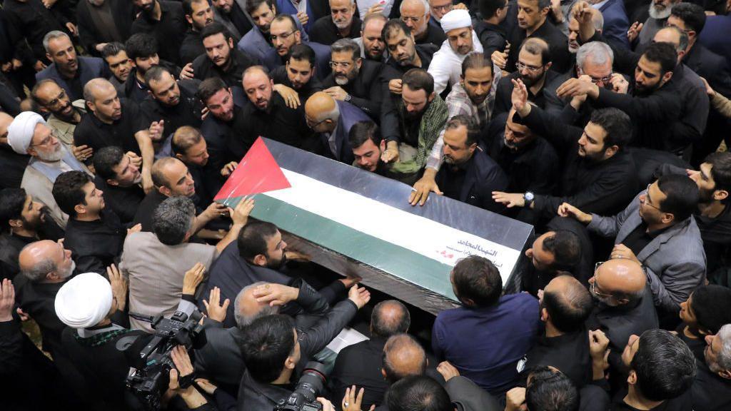 Mourners gather as Hamas leader Haniyeh buried in Qatar