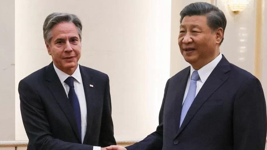 Xi