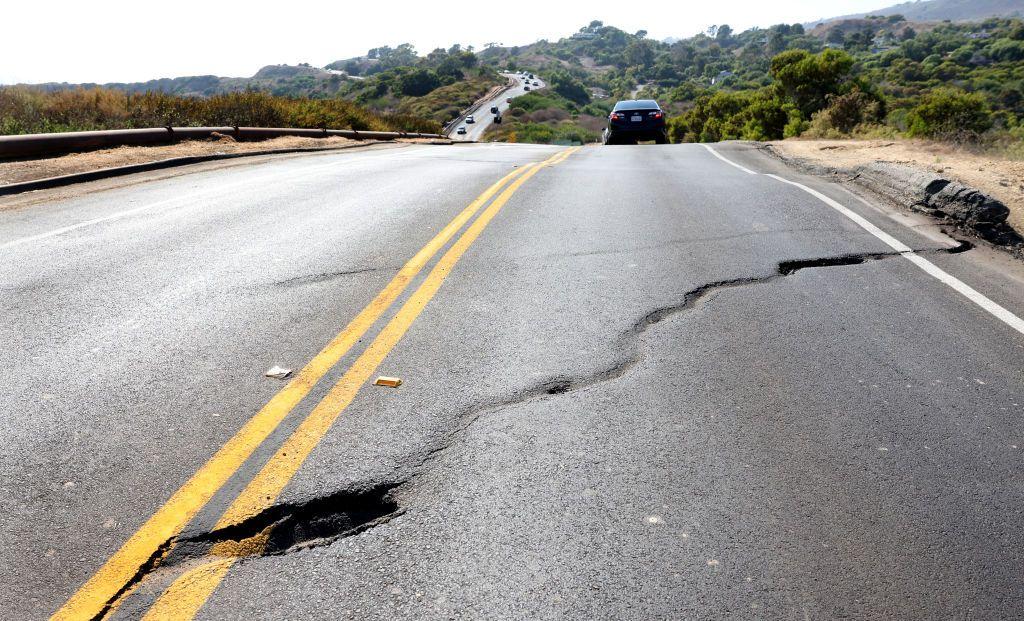 A crack in the road running through Rancho Palos Verdes, Los Angeles, California, United States, on August 31, 2024.