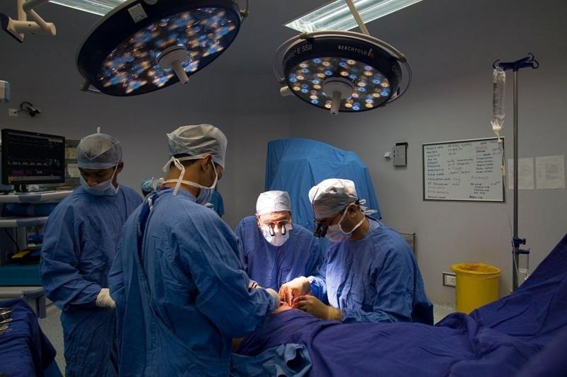 File image of doctors conducting surgery on a patient.