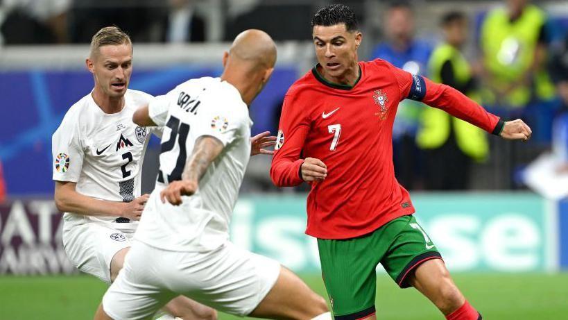 Tears to triumph for Ronaldo as Portugal beat Slovenia on penalties