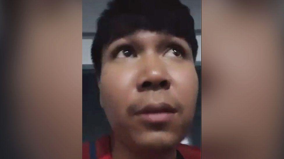 Udomporn Champahom filming himself in hiding