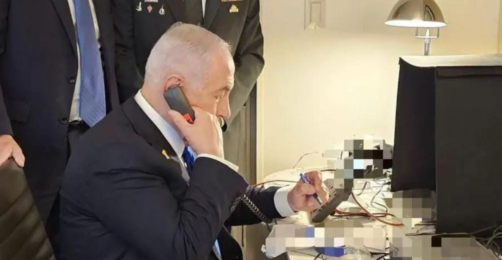 Foto que supostamente mostra Benjamin Netanyahu aprovando um ataque areo em Beirute visando a sede principal do Hezbollah, aparentemente de seu quarto de hotel em Nova York