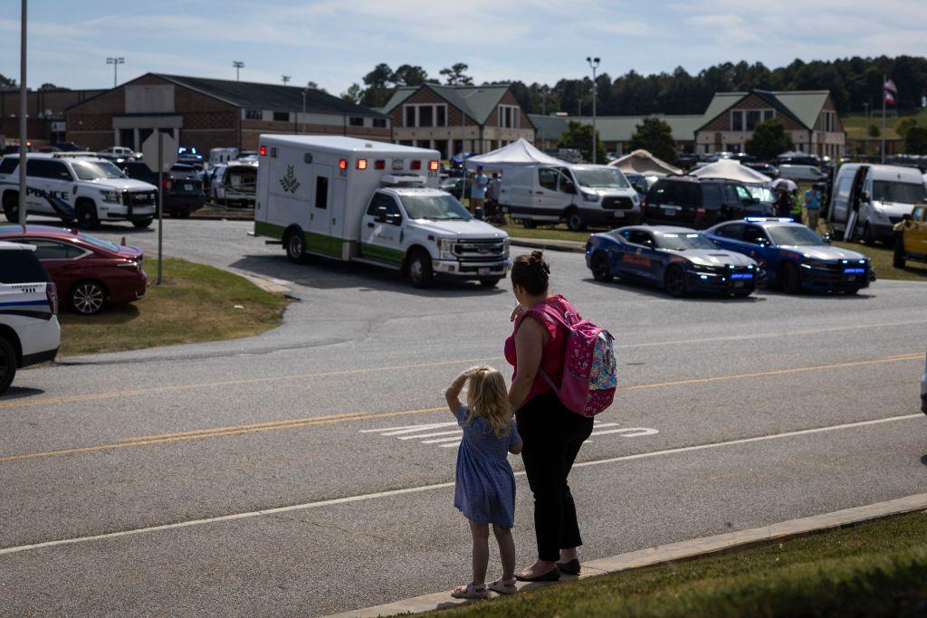 Boy, 14, arrested after four killed in US school shooting