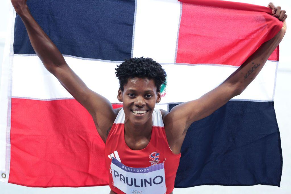 Marileidy Paulino with the flag of the Dominican Republic