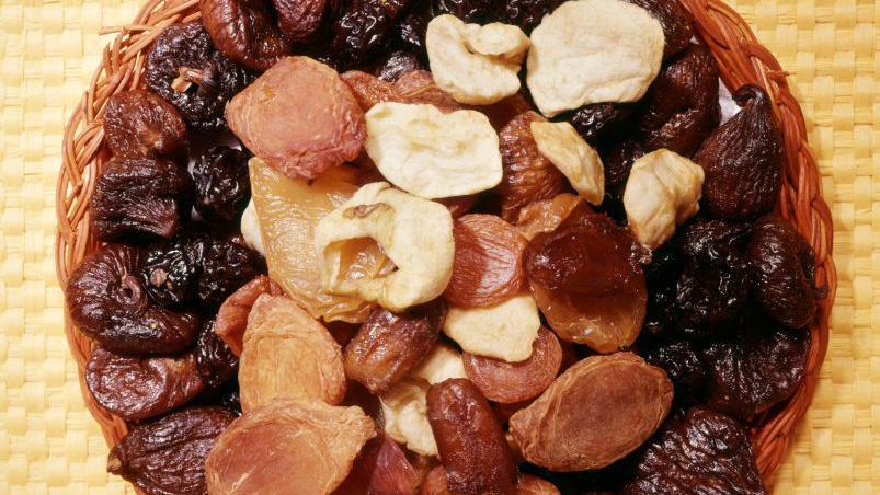 Dates, prunes and raisins in a bowl 