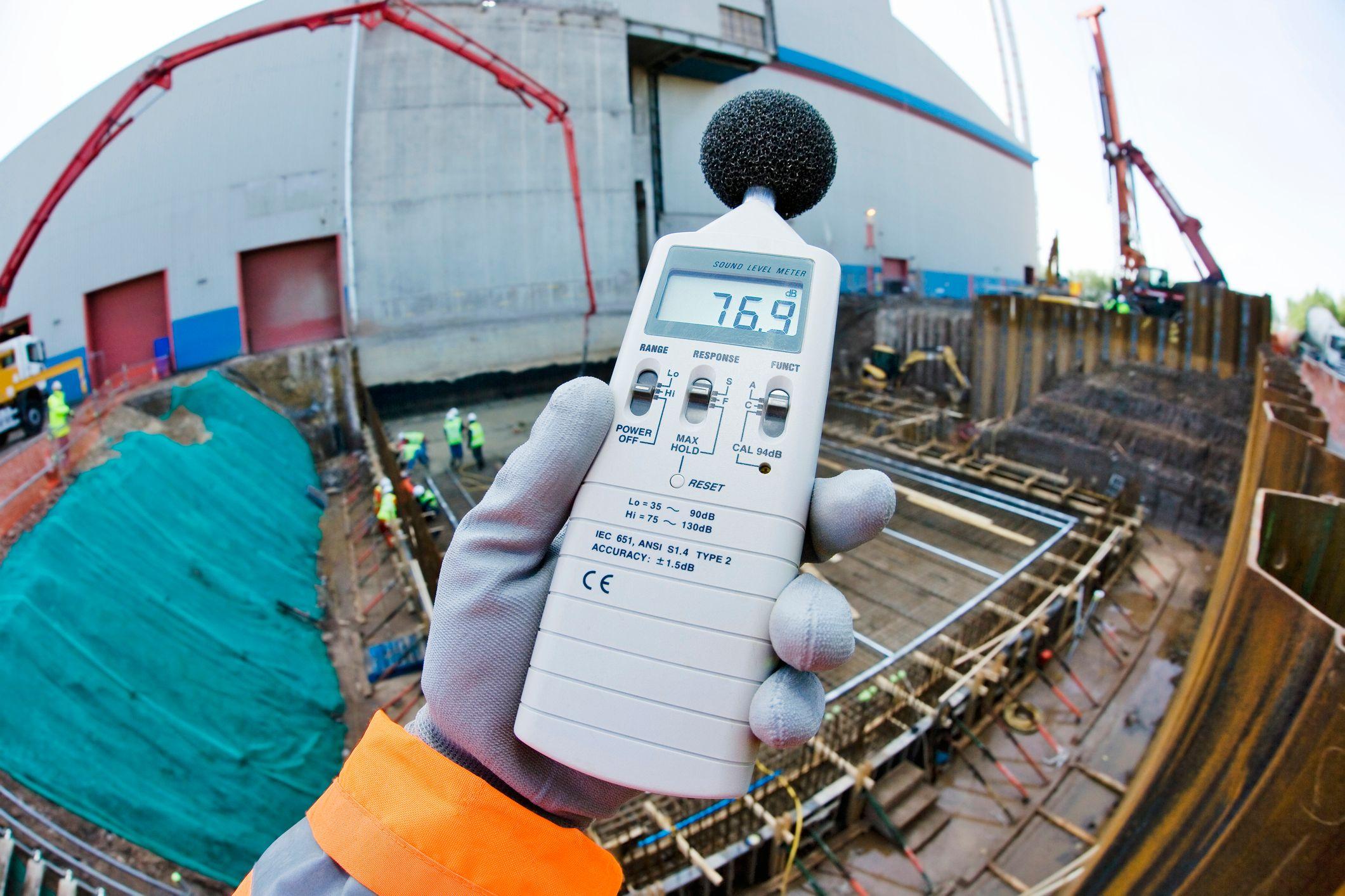 A sound meter records 76.9dB