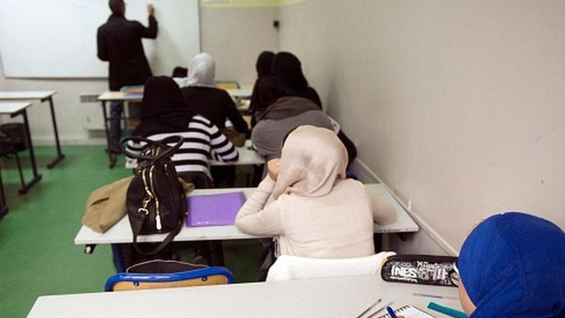 طلاب أثناء حصة دراسية في إحدى المدارس الإسلامية عام 2013