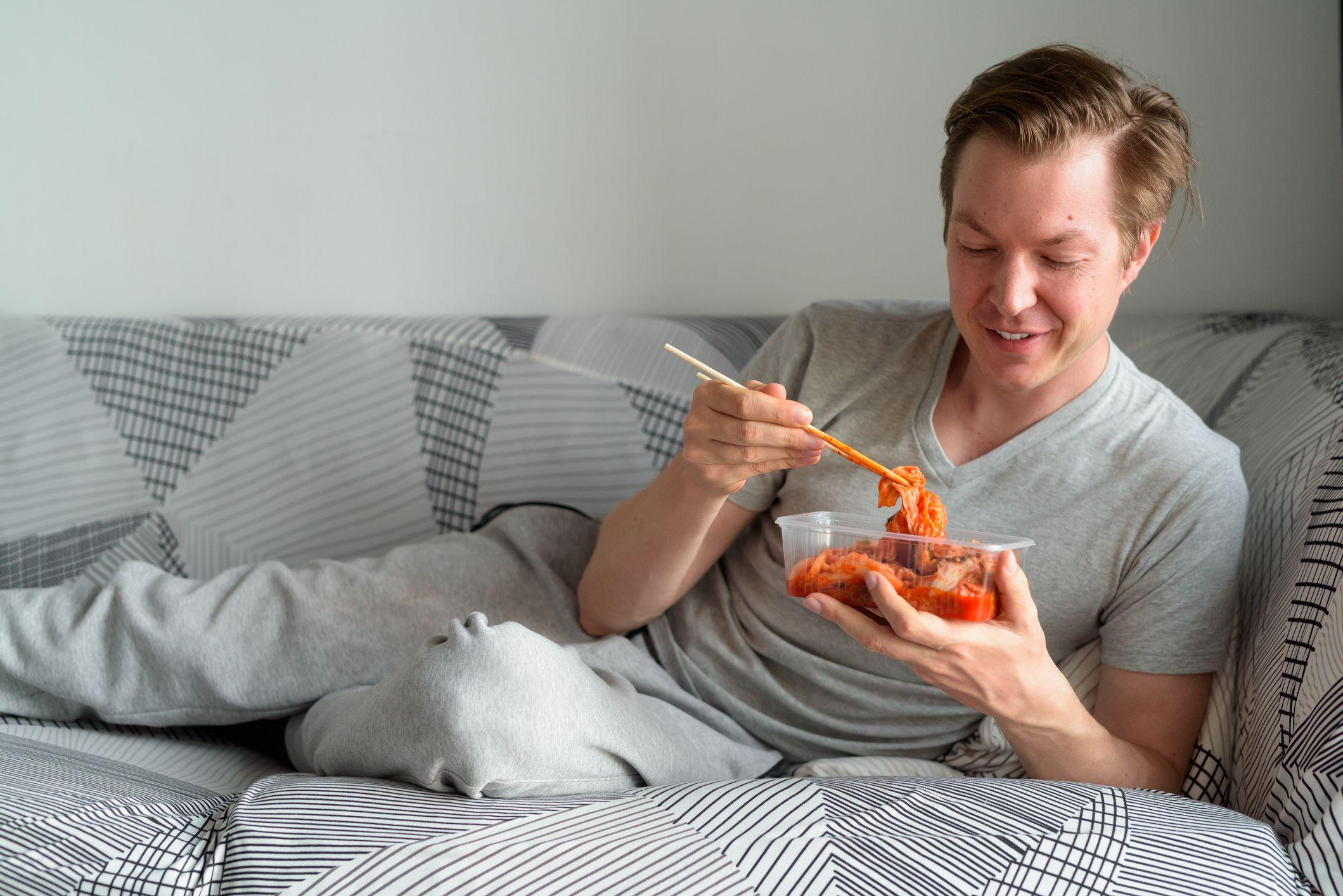 Man eating kimchi