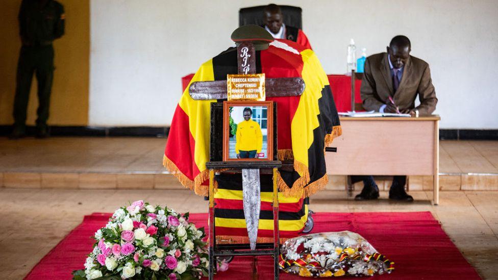 Funeral begins for Ugandan Olympian killed by ex-boyfriend