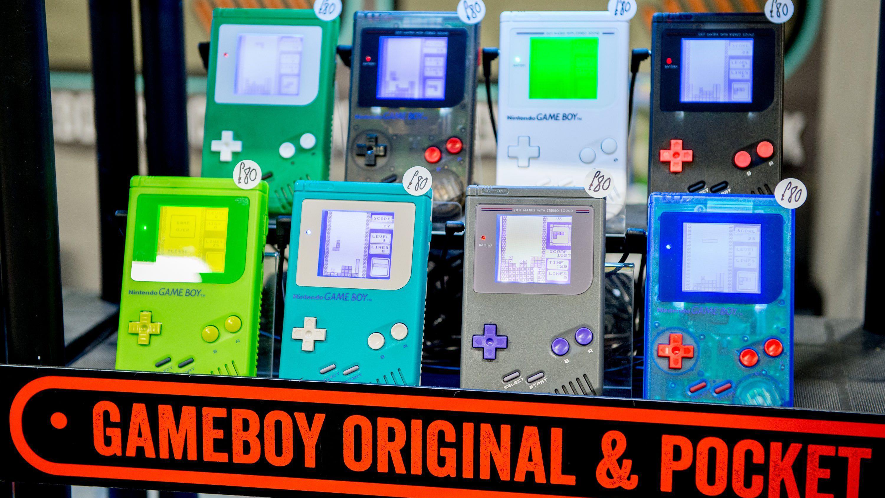Modified Gameboys with Tetris on their displays