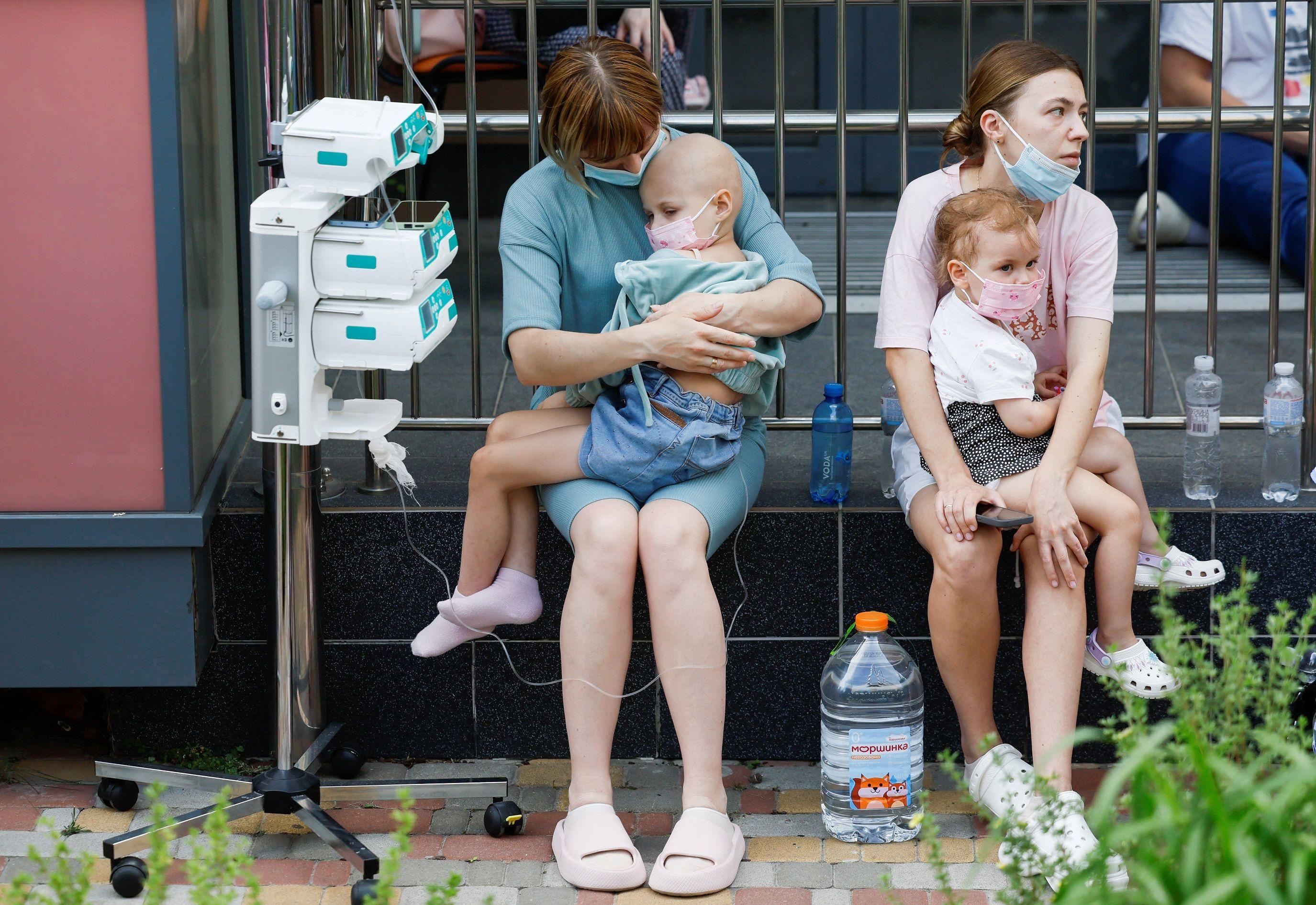 Children's hospital hit as Russian strikes kill dozens in Ukraine