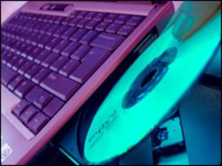 Computadora portátil y CD