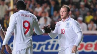 Emile Heskey và Wayne Rooney (PA)