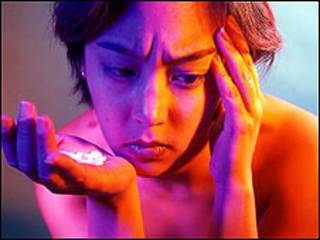 Mujer con migraña