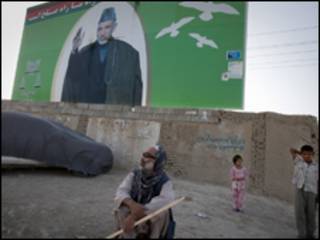 Poster com Hamid Karzai