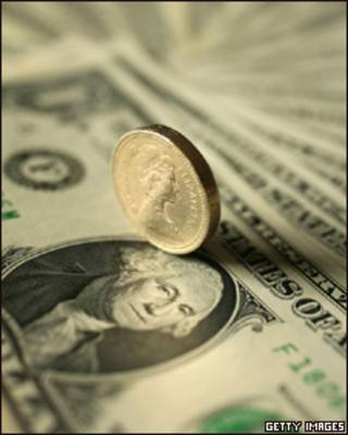 Un dólar y una libra esterlina