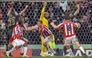 Liverpool draws with Stoke at last minute