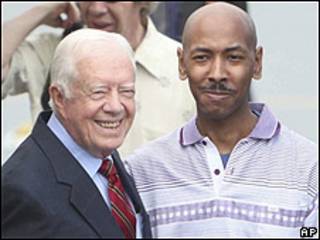 Carter e Aijalon Mahli Gomes em Pyongyang