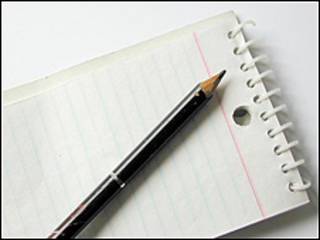 Lápiz y cuaderno de notas