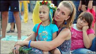 Жінка з дитиною, фото УНІАН