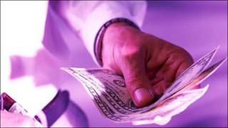 Man handing out money