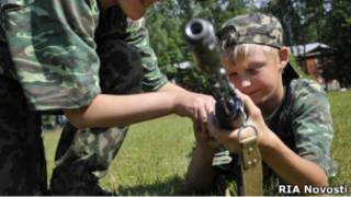 Школьник в военно-спортивном православном лагере