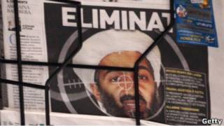 Primera plana de un diario con foto de Bin Laden