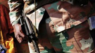 Un homme armé en République démocratique du Congo