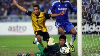 Pemain Malaysia menganggap bola belum lewat garis