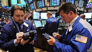 Operadores da bolsa de NY. Foto: AFP