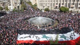 Mudaaharaad lagu taageerayo madaxweyne Assad