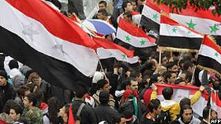 Também ocorreram manifestações de apoio ao presidente Bashar al-Assad em Damasco (AFP)