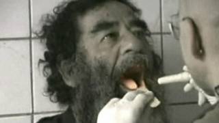 Захваченный Саддам Хуссейн